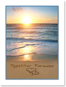 Photo of beach with hearts drawn in sand