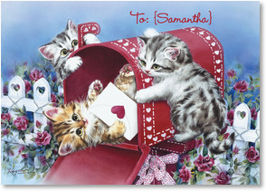 Kittens by red mailbox