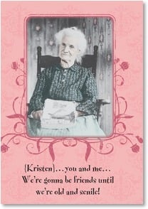 Old lady in chair holding magazine