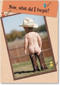 Bare bottomed baby in boots and hat