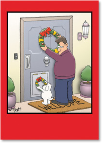 Man dog hanging wreaths on doors