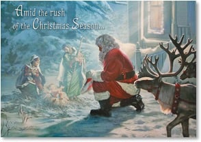 Santa kneels by Mary Joseph Jesus