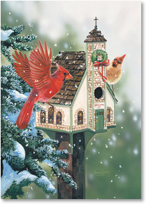 Cardinals on wreathed birdhouse