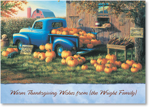 Blue truck full of pumpkins