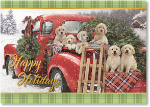 Puppies in back of red vintage truck