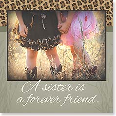 Two little girls in boots and dresse