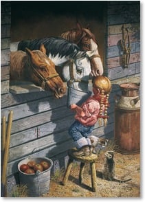 Girl feeding horses from pail