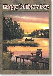 Silhouette of man in canoe fishing with dog