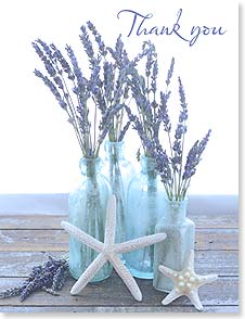 Lavender in blue bottles with starfish