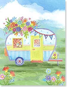 Camper trailer with Happy banner and flowers