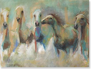 Five palomino horses running forward