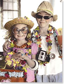 Kids dressed as tourist couple