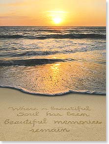 Sand writing on the beach with sunset in background