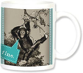 Chimpanzee swinging from tree branch