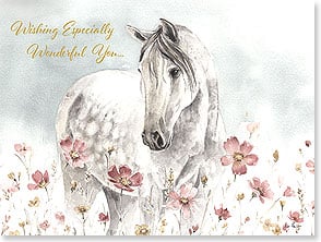 WHITE HORSE STANDING IN FLOWERS