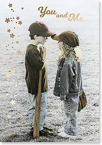 BOY AND GIRL FACE TO FACE IN BASEBALL CAPS