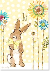 Brown bunny wearing yellow bow