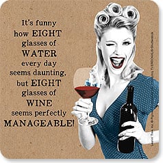 Sexy vintage woman winking with wine bottle and glass