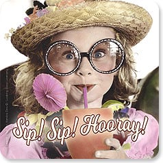 funny girl with hat and glasses sipping on a drink