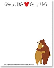 Two bears hugging