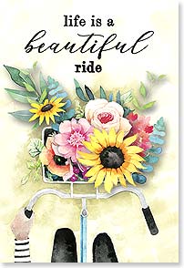 Flowers in a bike basket on bike