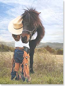 A little cowgirl gives a hug to her horse