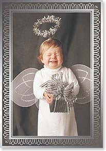Little angel holding gift