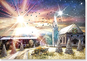 beams of light radiate from the sky over a church at christmastime