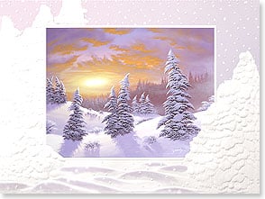 Pine trees in snowy forest at sunrise