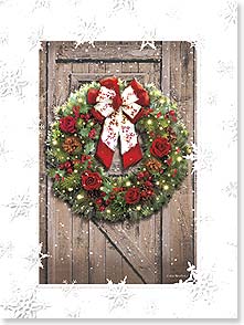 Christmas wreath on barn wood door
