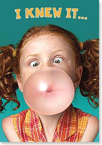 RED-HEADED GIRL BLOWING BUBBLE