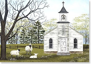 two sheep and a lamb in the grass beside an old country chapel