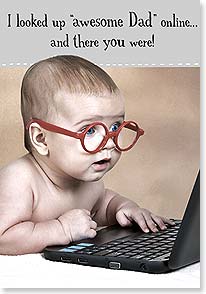 BABY WITH GLASSES LOOKING AT COMPUTER SCREEN