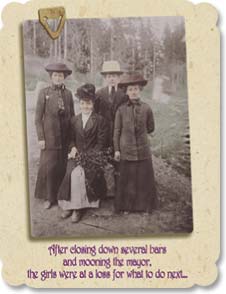 4 women with big hats in the forest