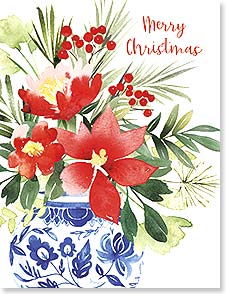 Poinsettias in blue and white vase