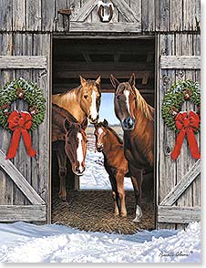 Four horses look out barn door during winter